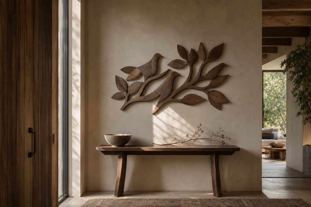 Wooden botanical wall art styled in an entryway